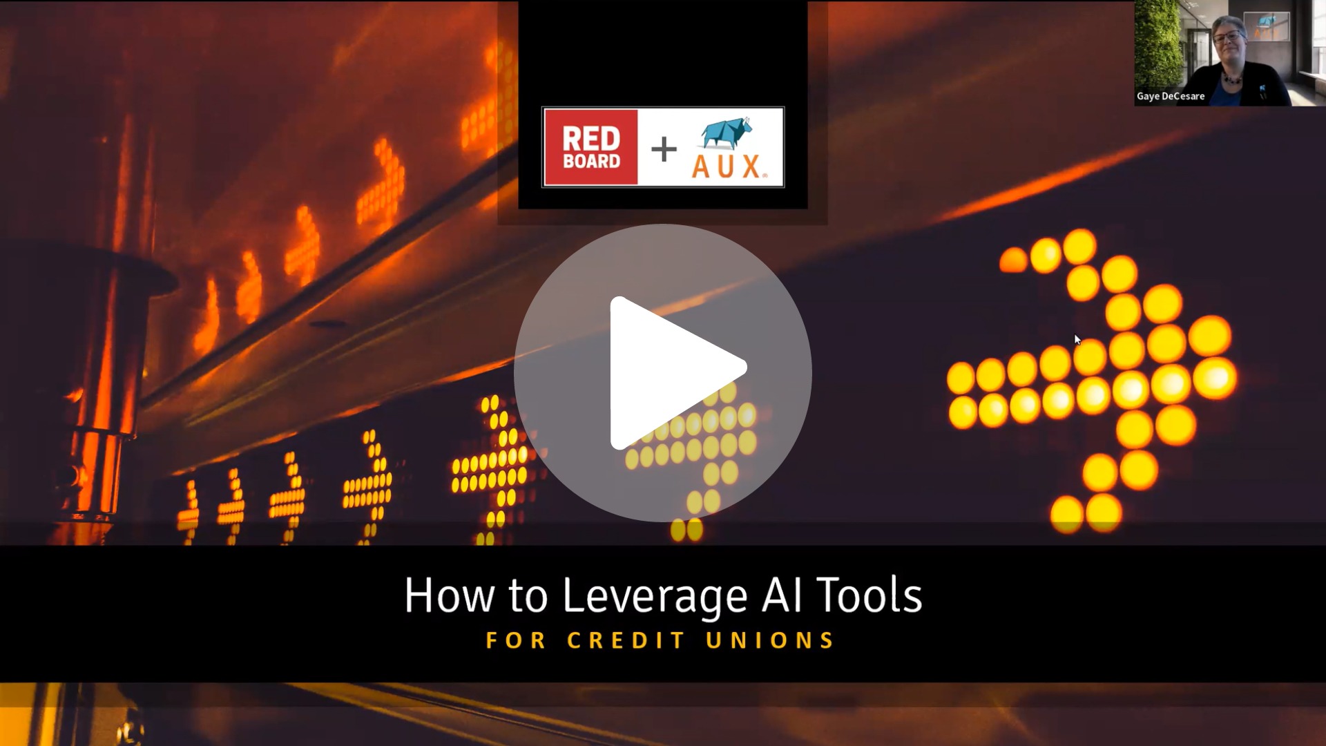 PLAY BUTTON: The image displays a presentation slide with a dark background. At the top, there is a logo combination for "RED BOARD + AUX." In the middle, an arrow is creatively illustrated with bright orange dots against the dark backdrop, symbolizing progress or direction. Below this, a title in a prominent black bar reads "How to Leverage AI Tools" in white text, with a subtitle "FOR CREDIT UNIONS" indicating the focus of the presentation. The design conveys a sense of innovation and forward-thinking, particularly in the context of financial services and technology.